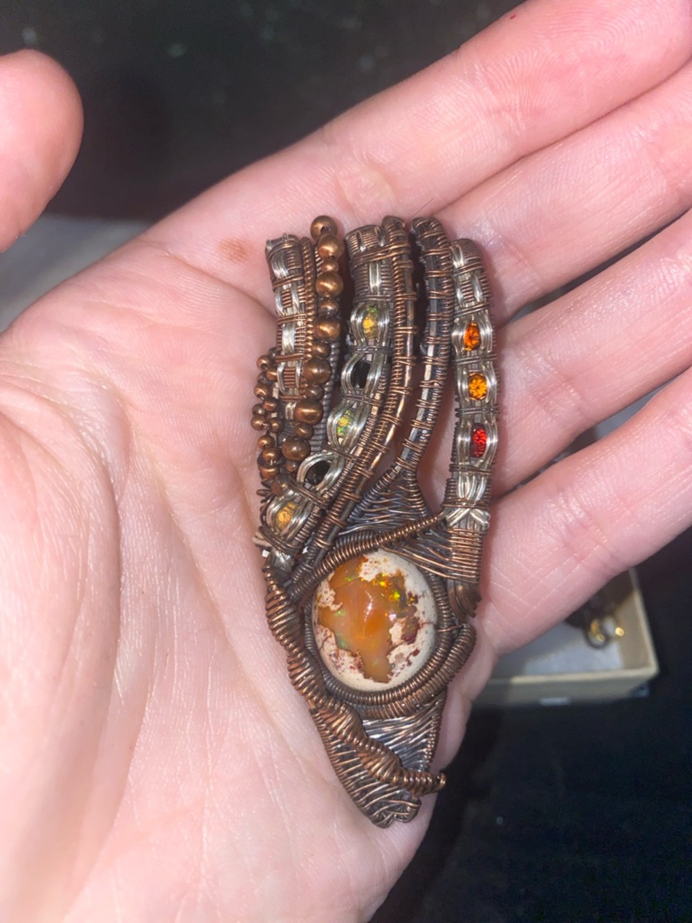 Handmade intricate wire wrapped pendant with all real stones (fire opal?)